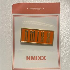 NMIXX Orange Metal Badge